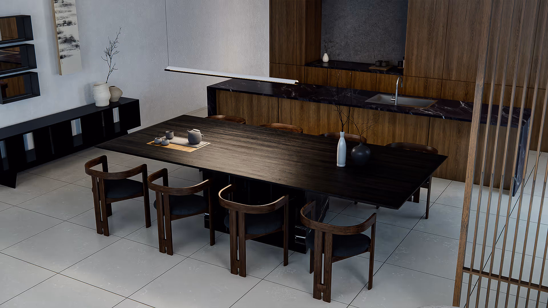 A sense of harmony defines this open dining-kitchen setting. The black wood dining table extends parallel to the walnut-paneled kitchen, blending materiality and function. Natural light and gentle asymmetries soften the space, making it feel quietly composed yet warmly livable.