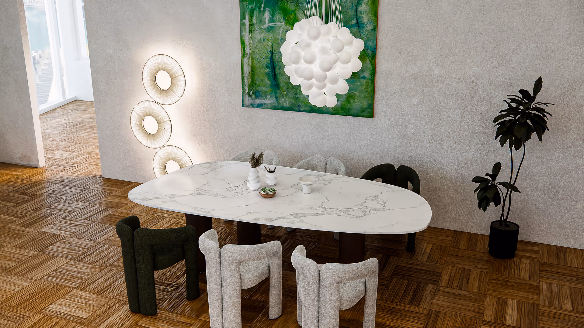 This dining scene is anchored by a smooth marble tabletop with subtle grey veining, surrounded by fabric chairs in soft ivory and deep green. The desaturated wall tone allows the green artwork to serve as a lively contrast, while the wood floor adds grounded warmth to balance the airy palette.
